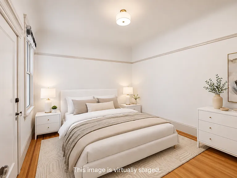 3rd bedroom with window on the left