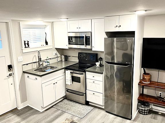 Kitchen area. Some decorations and kitchen supplies have changed/upgraded.