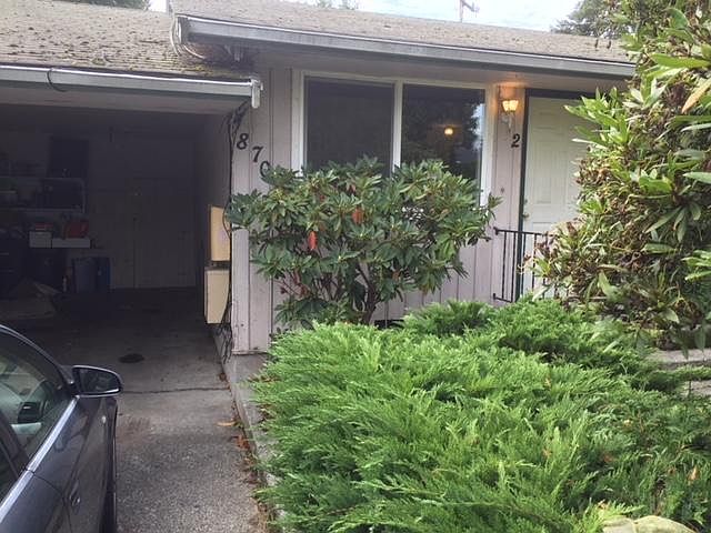 Front entrance, driveway & carport