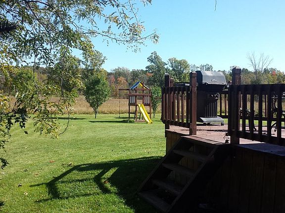 Deck with playscape in back