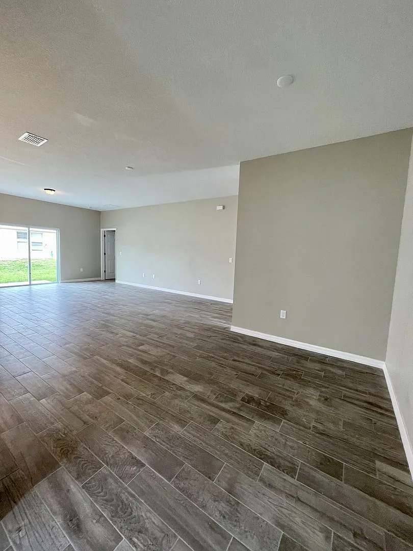 Brand-New 4-Bedroom Beauty in Poinciana Modern Upgrades & Stunning Kitchen! — Photo 3