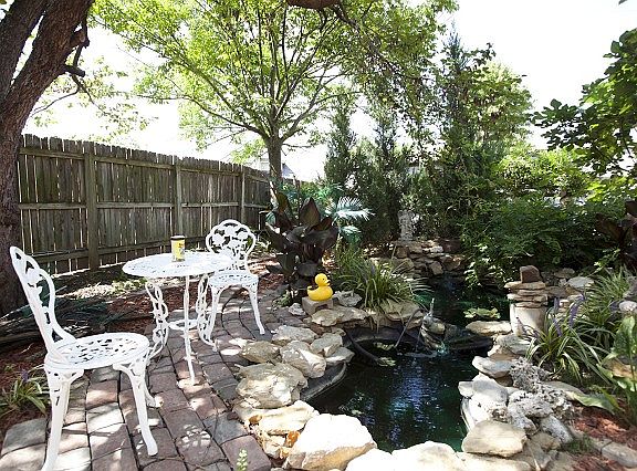 Relaxing patio with koi pond