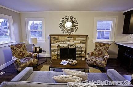 Livingroom
						:
						Solid Wood Floors, Stone Fireplace, Solid Cedar Mantle, LED Lighting