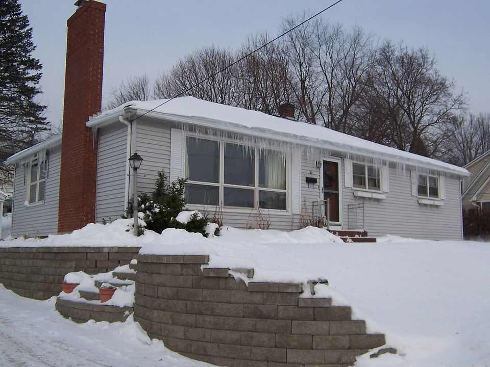 Street view w/ retaining wall