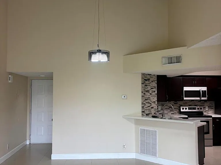 8761 Wiles Rd #304 — Photo 4