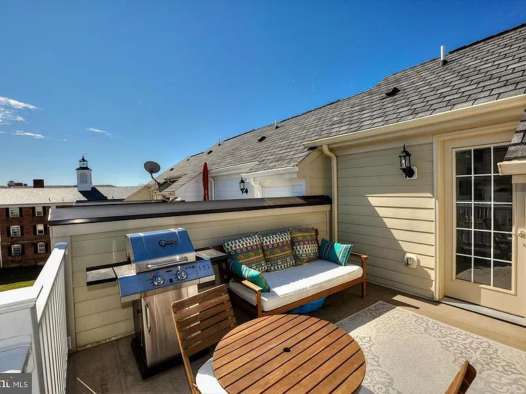 Large rooftop deck ready to enjoy outdoor cooking.