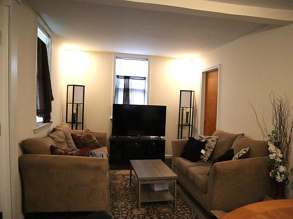 Cozy living room, well lit with adjustable cam lights to keep the electric bills down