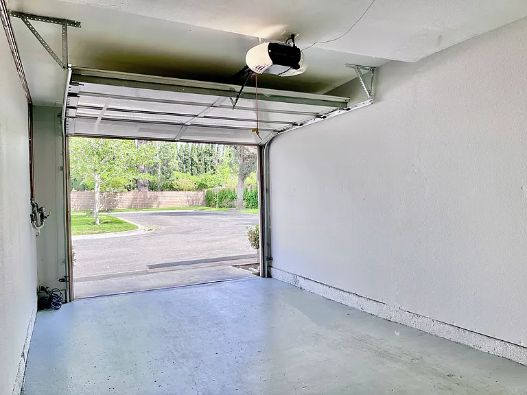 Step free and direct access Attached Garage. Adjacent carport directly across from garage.