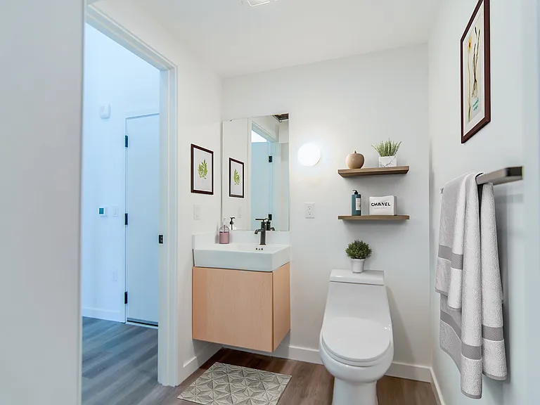Modern bathroom with a toilet and sink at Alt Capitol Hill.