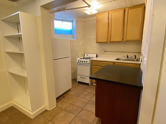 5th image of 107 E 19th St APT 5