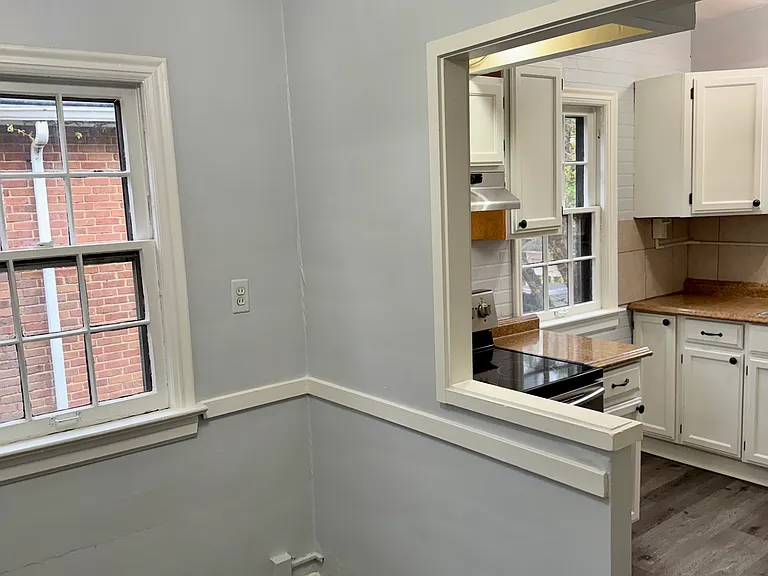 Eat-in kitchen area, ideal for a small table, breakfast nook, or extra storage.