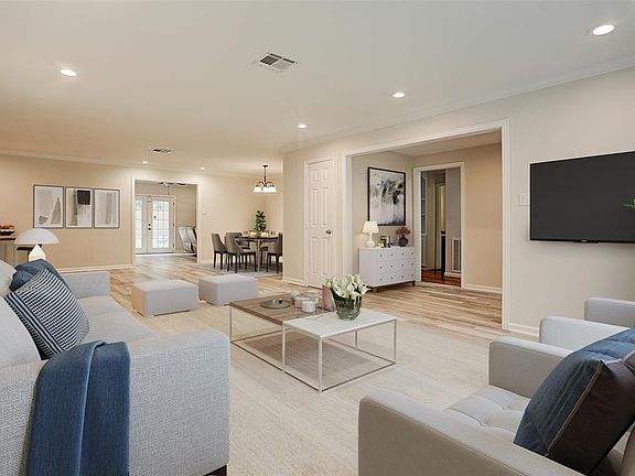 Living Room virtually staged to give you a great idea of house to position your furniture