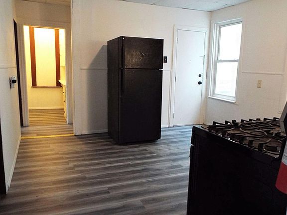 Kitchen, pantry, rear entry to unit.