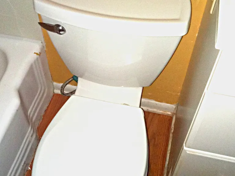 Toilet in the first bathroom