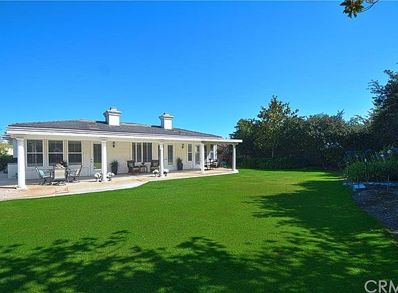 Featuring a gorgeous 18,500 SF (approx.) Level Lot with lots of room for family fun.