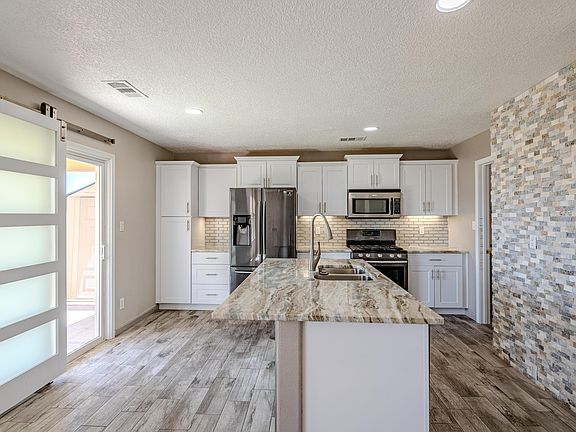 4th image of 8132 Bluffs Edge Pl NW
