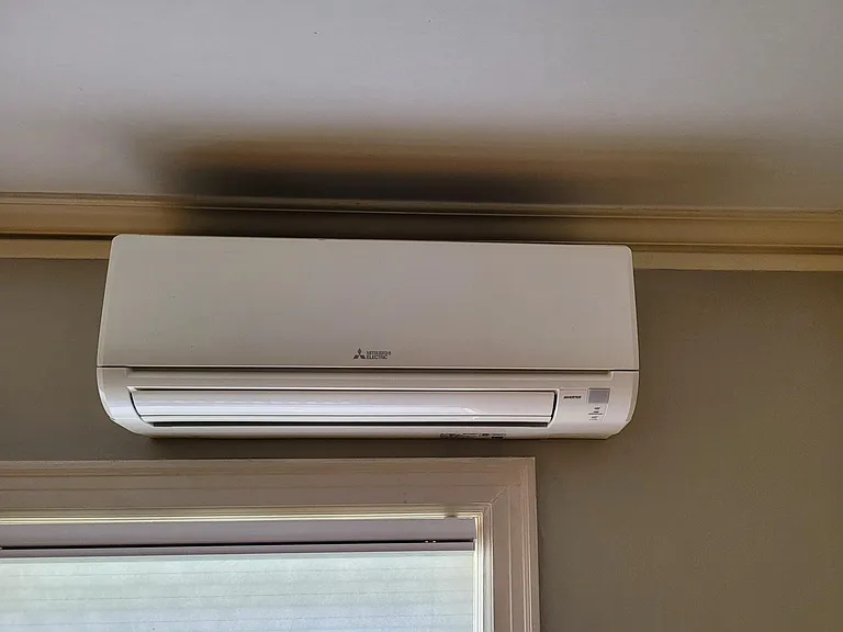 Dining room, mini-split ductless AC unit, (one of two in unit)