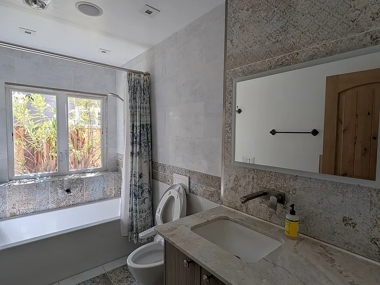 2nd Bathroom has a full size tub, is very well lit and has a light-up mirror as well as a toto-washlet.