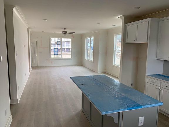 1st Floor living space with kitchen, living room and island top