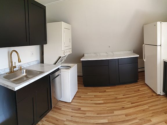 Enjoy the ease of in-unit washer and dryer tucked right into your newly updated kitchen _ laundry has never been more convenient.