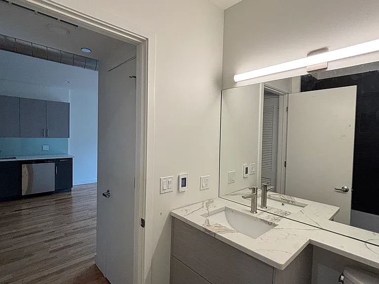 Second bathroom off kitchen/living area