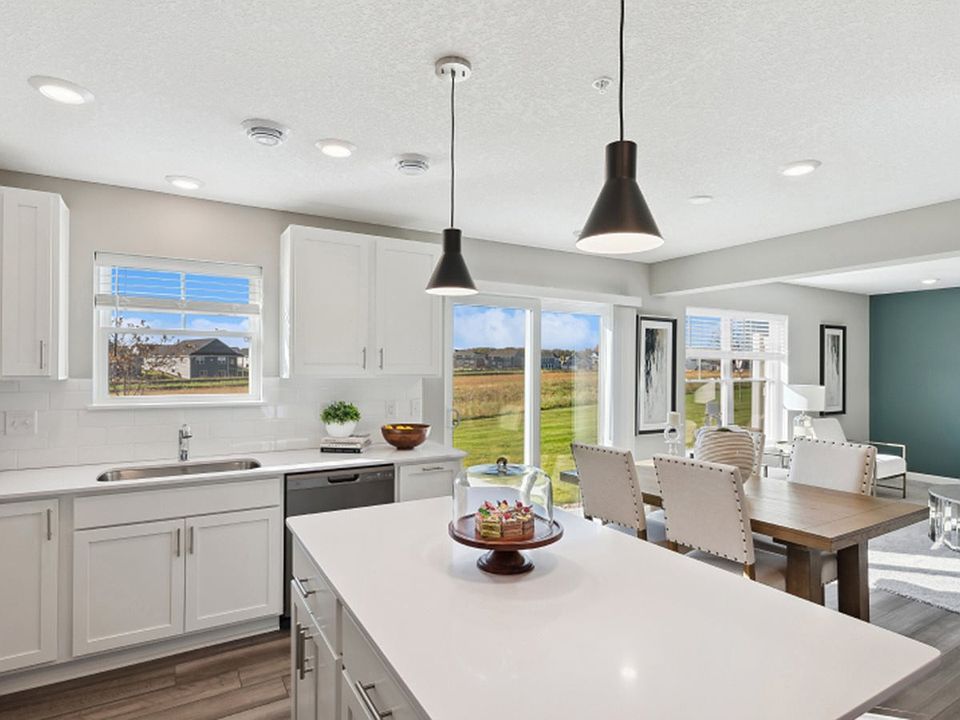 Kitchen:
Designed for cooks of all skill levels, the modern kitchen comes well-equipped with high-end appliances for simplified mealtimes, along with sleek cabinetry and a pantry for tons of food storage space.