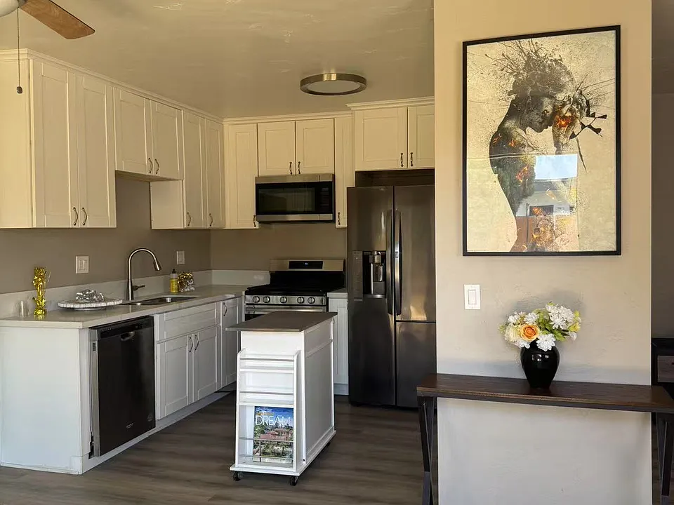 The entrance with a side table and beautiful and modern picture.