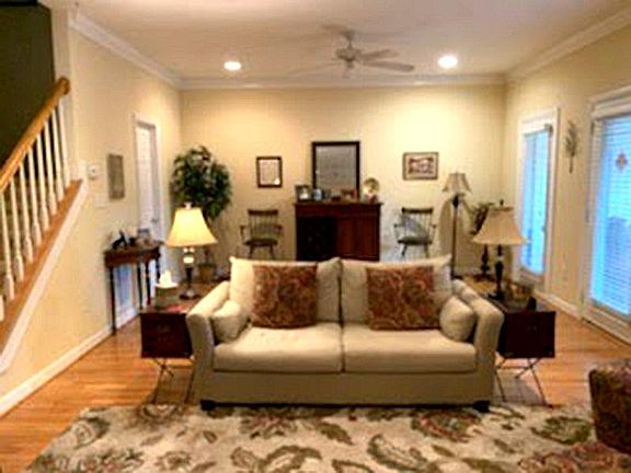 Living Room View back. This is the decoration from current tenants. The living room is very large, that you can even divide into two areas.