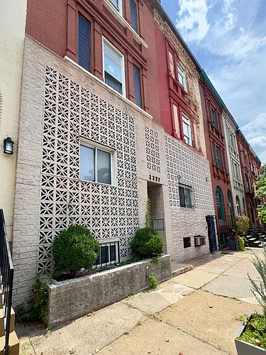 For Rent: Classic Urban Living at 2227 St Paul St Your City Retreat Awaits! Photo 1