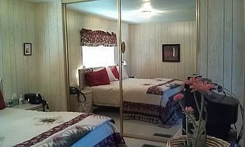Master Bedroom with mirrored closets