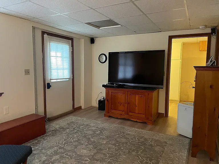 Cozy family room/den with 120" flat screen TV with Apple TV
