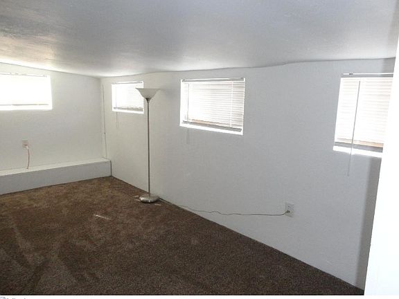 New windows and carpet in the bedroom.
