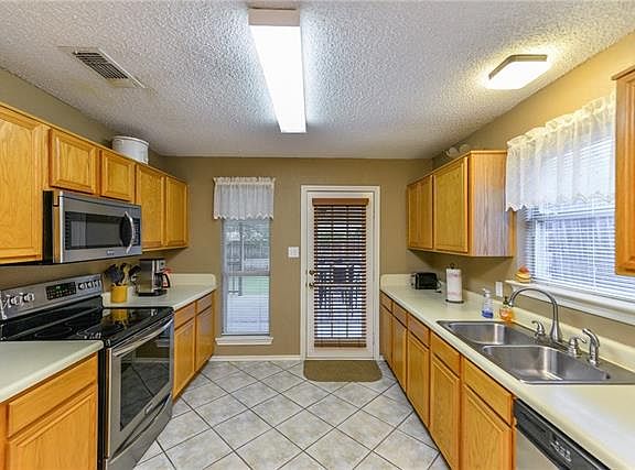 3rd image of 2116 Whispering Wind St