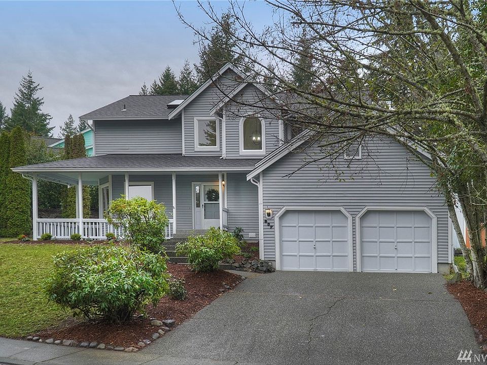 This lovely corner lot home has an oversized garage with lots of storage.