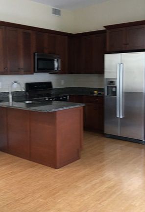 Stainless steel appliances, electric range.