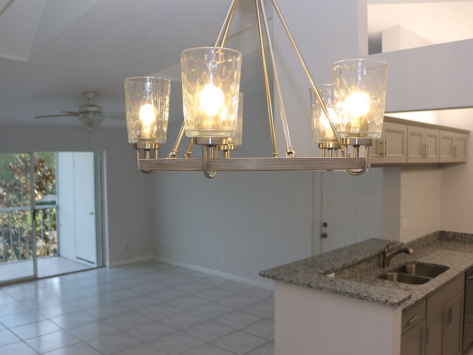 Main Living Area. Modern Granite and Stainless Steel Kitchen. Cathedral Ceilings with Skylights.