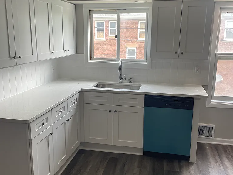 New kitchen cabinets, quartz countertops, and appliances