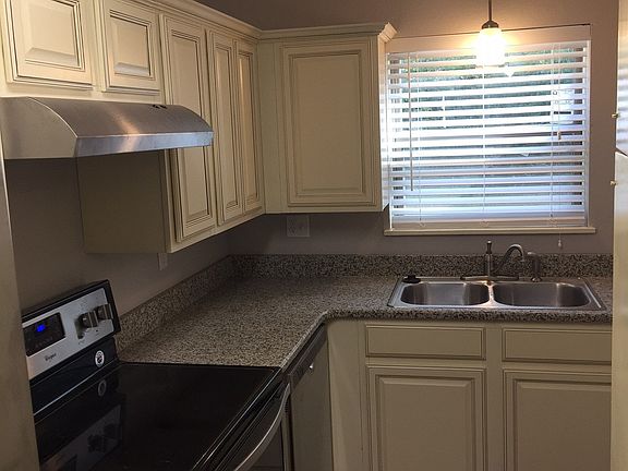 Kitchen with new cabinets, appliances, and granite counter t
