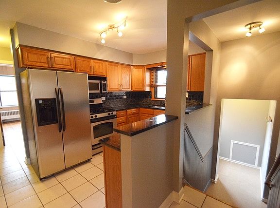 4th image of 9729 S Millard Ave