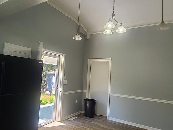 Spacious eat in kitchen with high ceilings