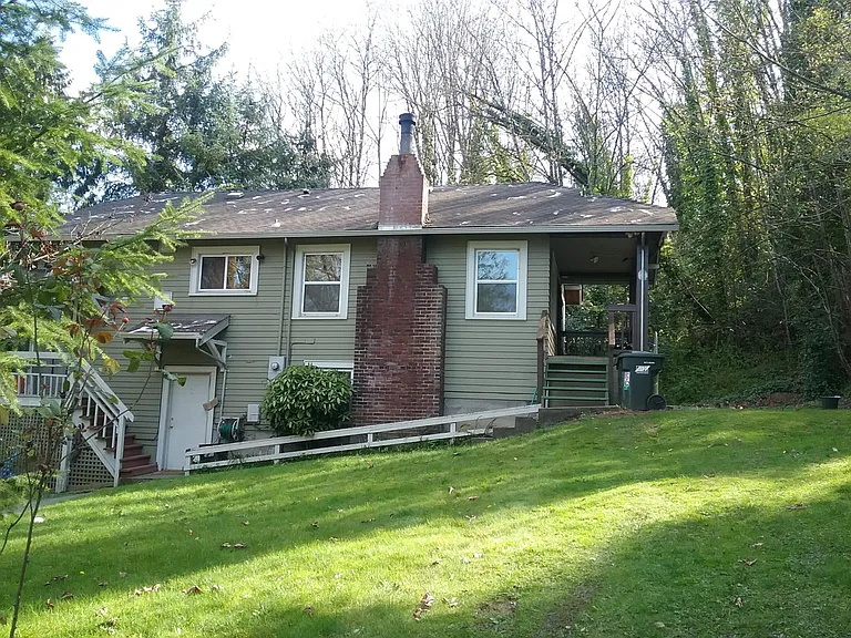 House nestled in greenbelt
