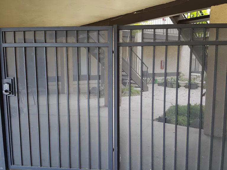 Locking security gate to back access