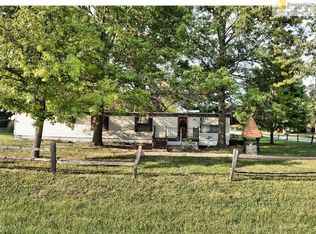 210 S Franklin Dr, Raymore, MO 64083
