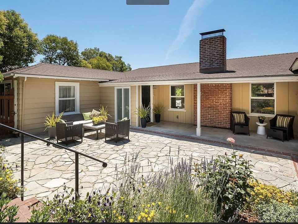 Front of house from street level. Apartment is lower level and is much more private.