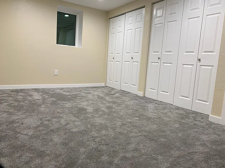 First Bedroom with great lighting on dimers for your liking.