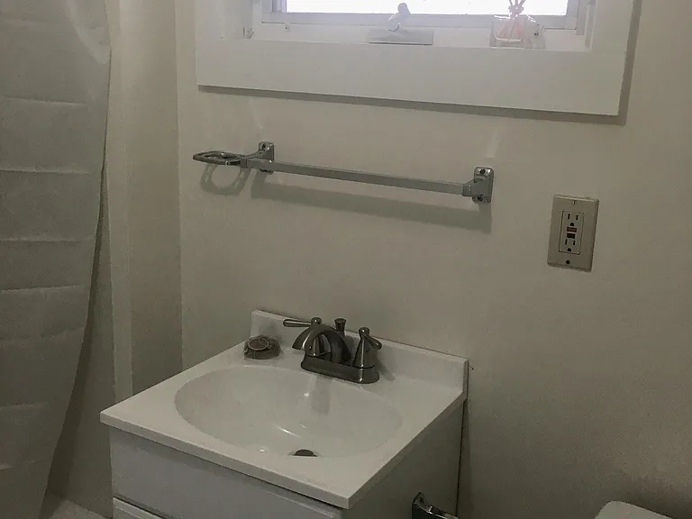 Sink with storage below.