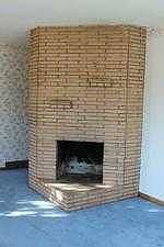 Wood burning fireplace in living room