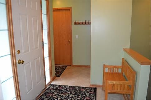 Whether guests are entering through the front door or you're coming in through garage you'll love this spacious foyer.