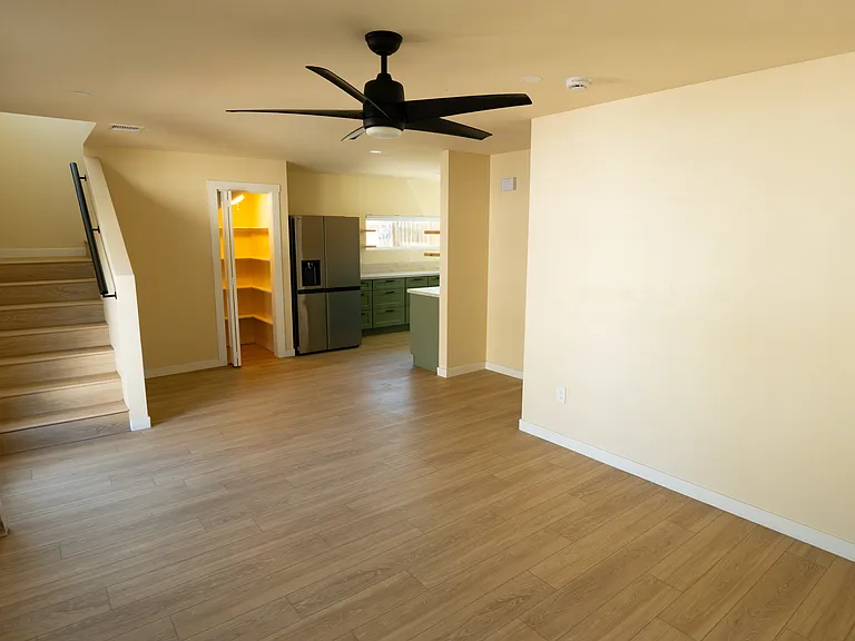 Living room, pantry, kitchen and stairs