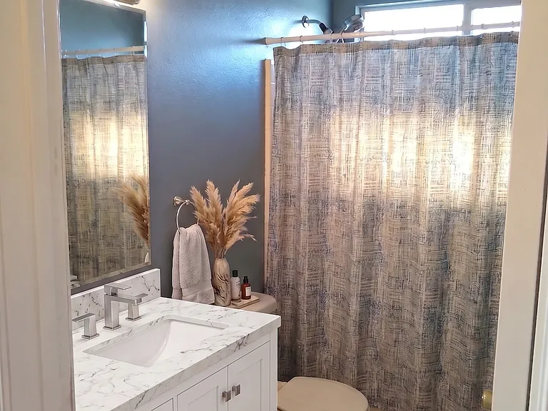 Upstairs bathroom (with vanity and floor shown)